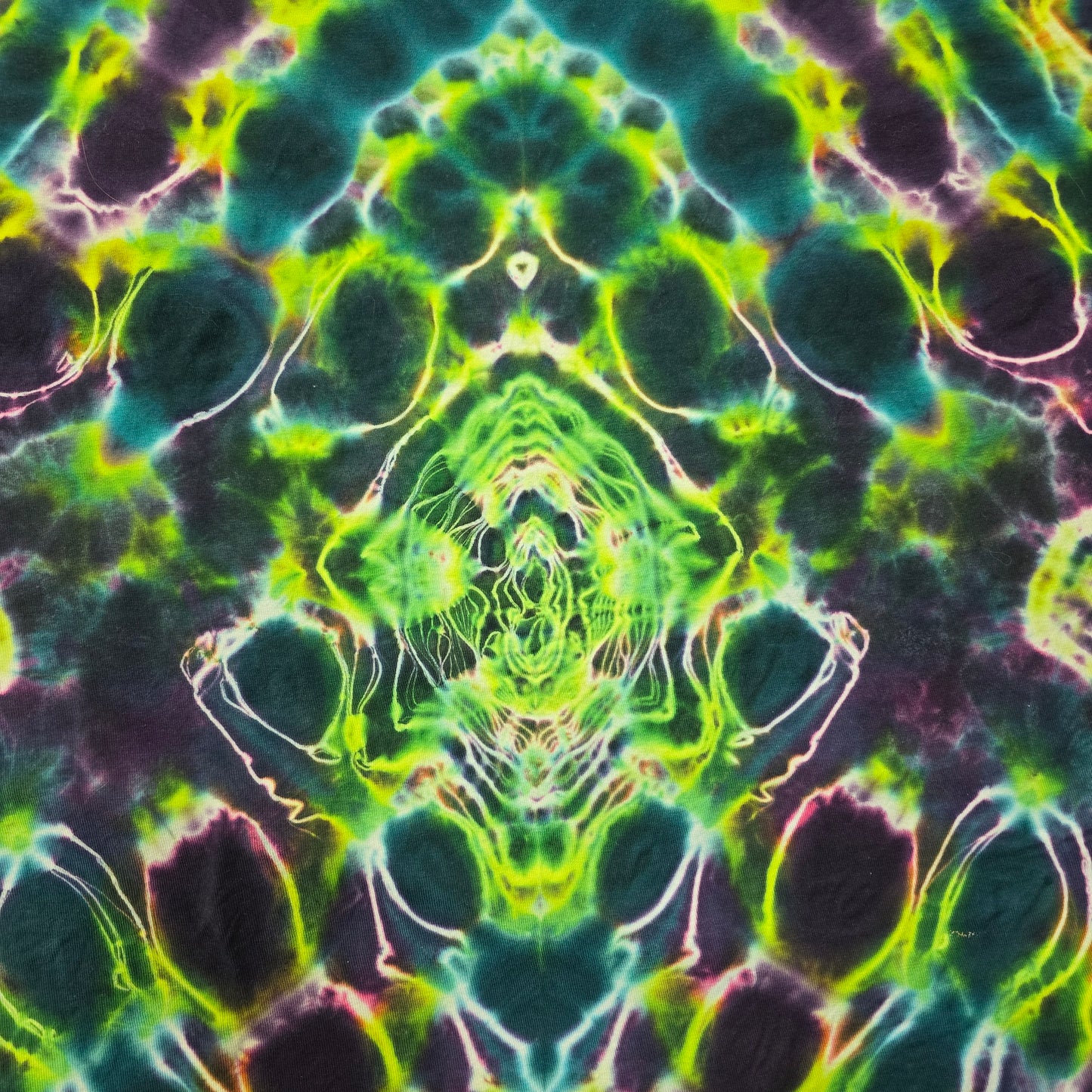 Colorful abstract pattern with green and purple hues
