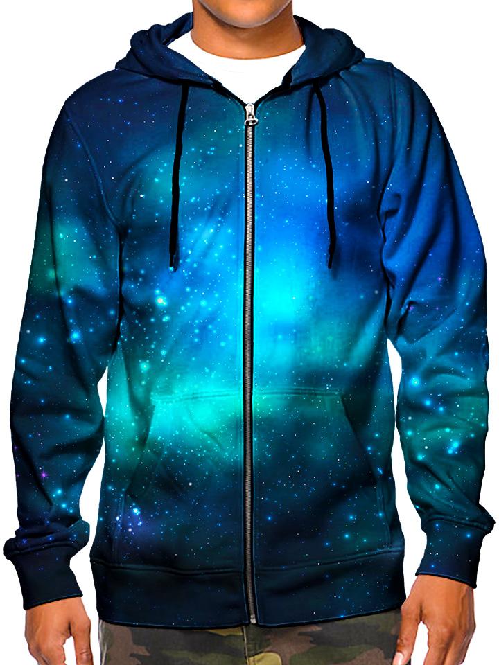 Model wearing GratefullyDyed Apparel deep blue galaxy zip-up hoodie.