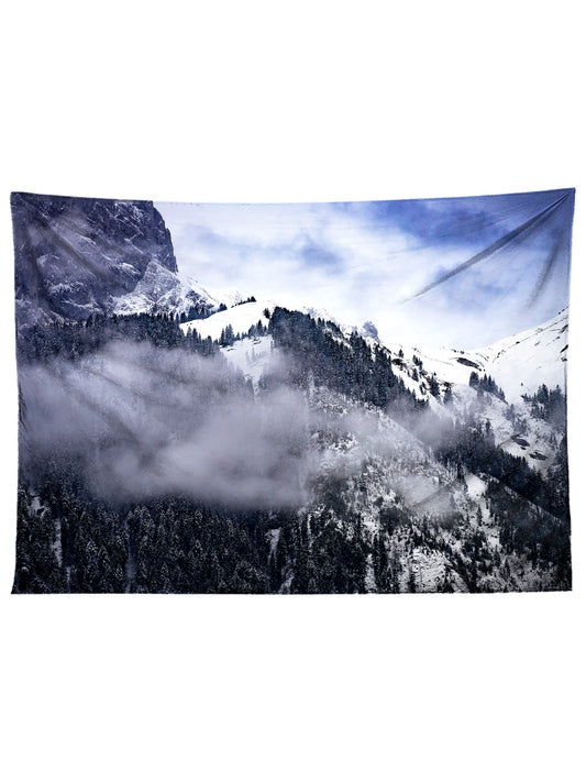 Horizontal hanging view of all over print black & blue forest mountain tapestry by GratefullyDyed Apparel.