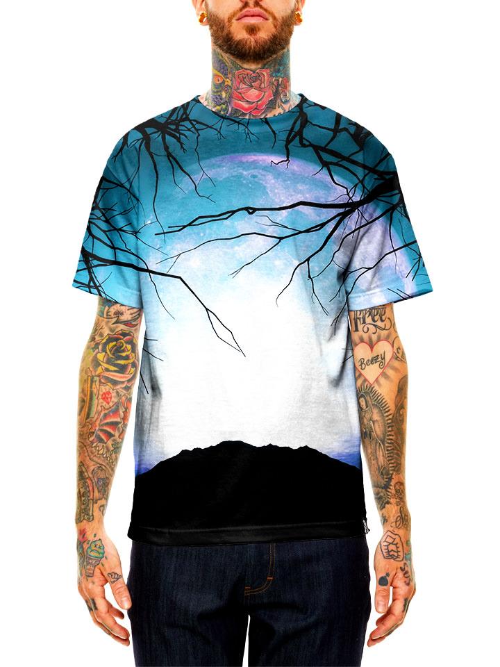 Model wearing GratefullyDyed Apparel white, blue & black tree space unisex t-shirt.