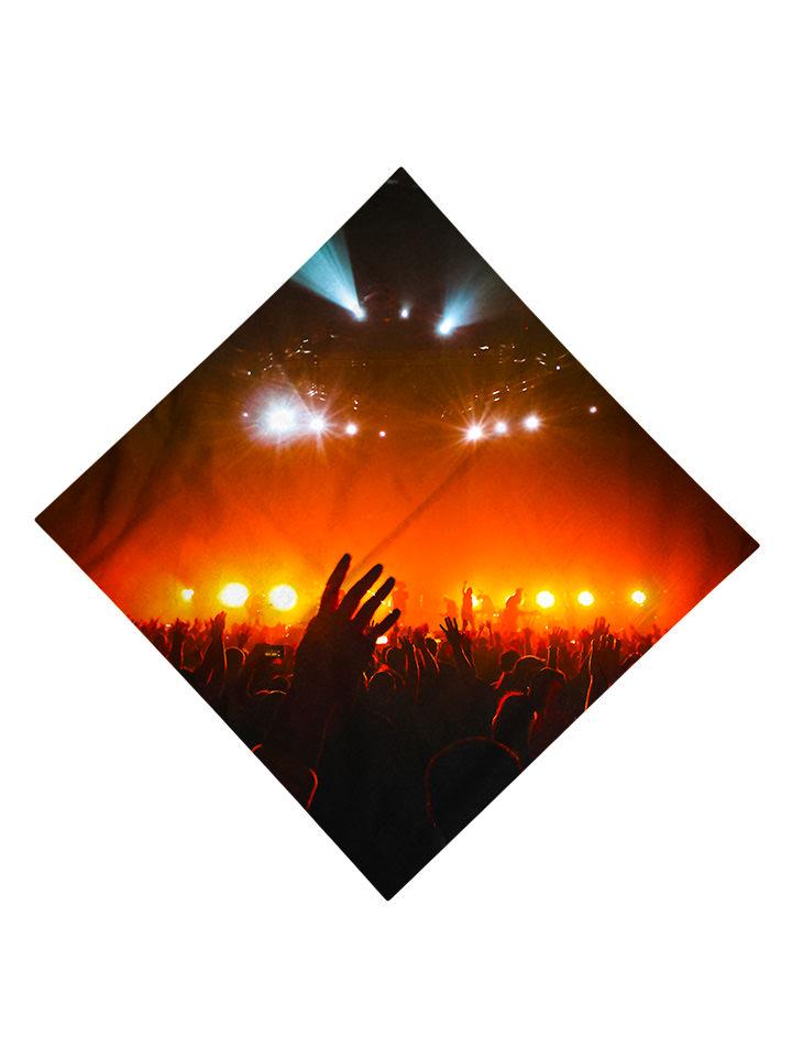 Bright red concert lights with crowd silhouette bandana flat view
