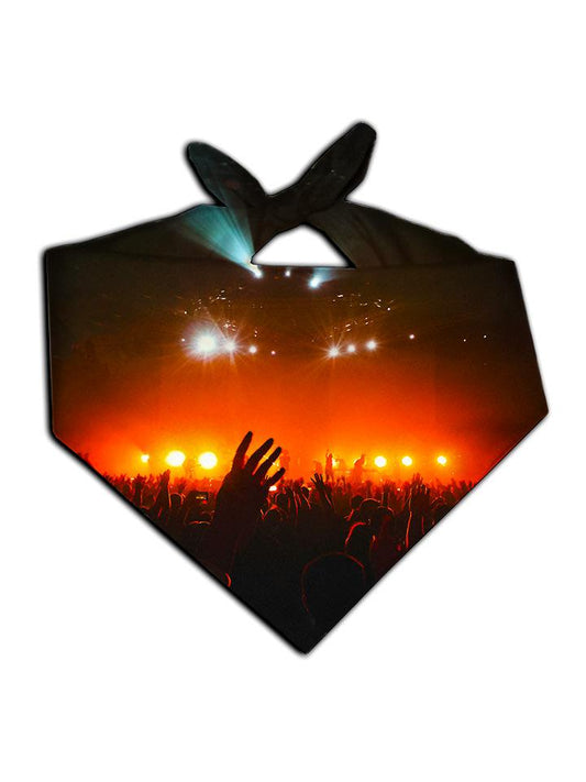 Bright red concert lights with crowd silhouette bandana