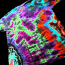 A close-up of a tie-dye t-shirt featuring a vibrant, neon-like pattern of purple, green, orange, and blue on a black background.
