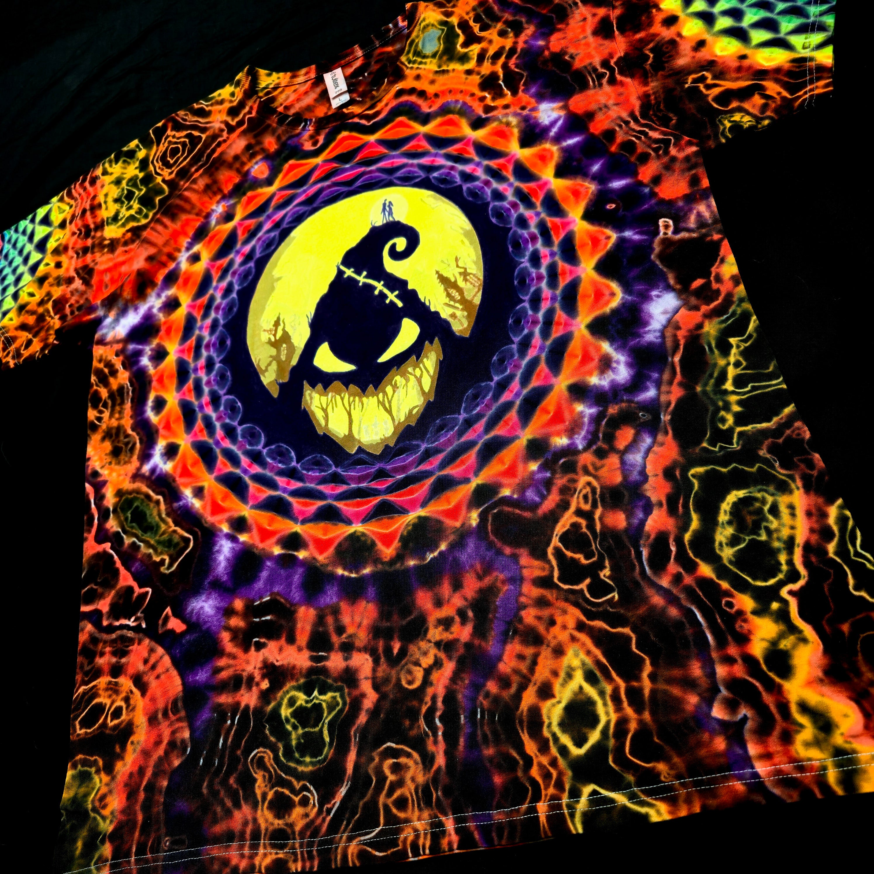 Colorful Halloween-themed tie-dyed t-shirt  with Oogie Boogie silhouette 