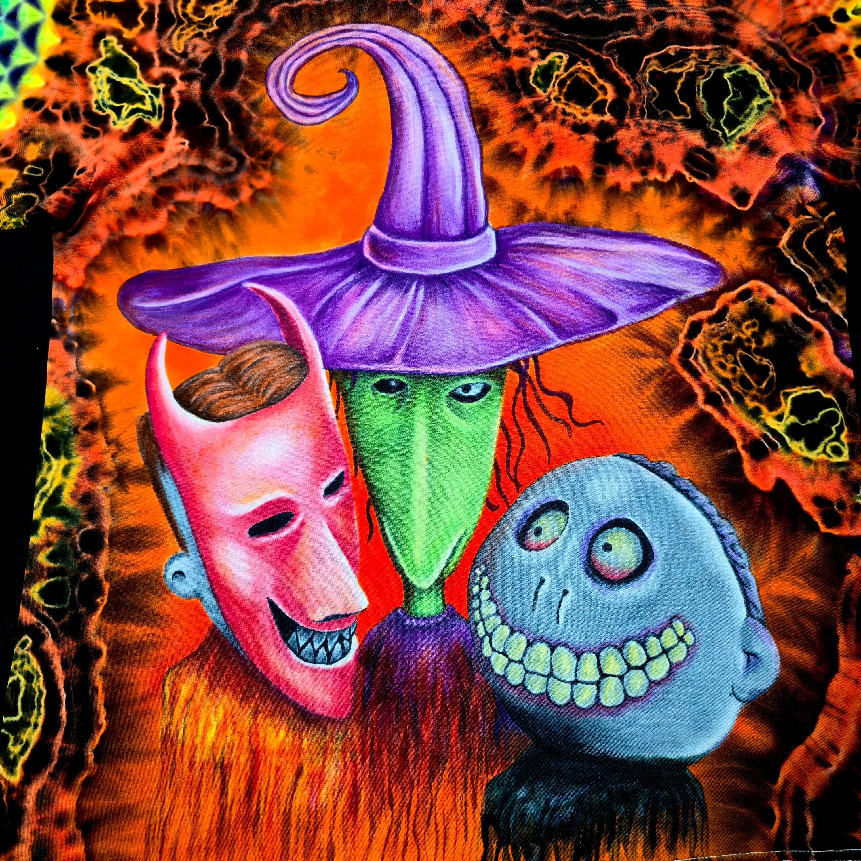 Close up of mischievous trio of trick-or-treaters