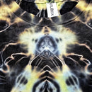 Close-up of a tie-dye t-shirt featuring a symmetrical, kaleidoscopic pattern in black, yellow, and white. The brand tag 'fullex' is visible inside the collar.