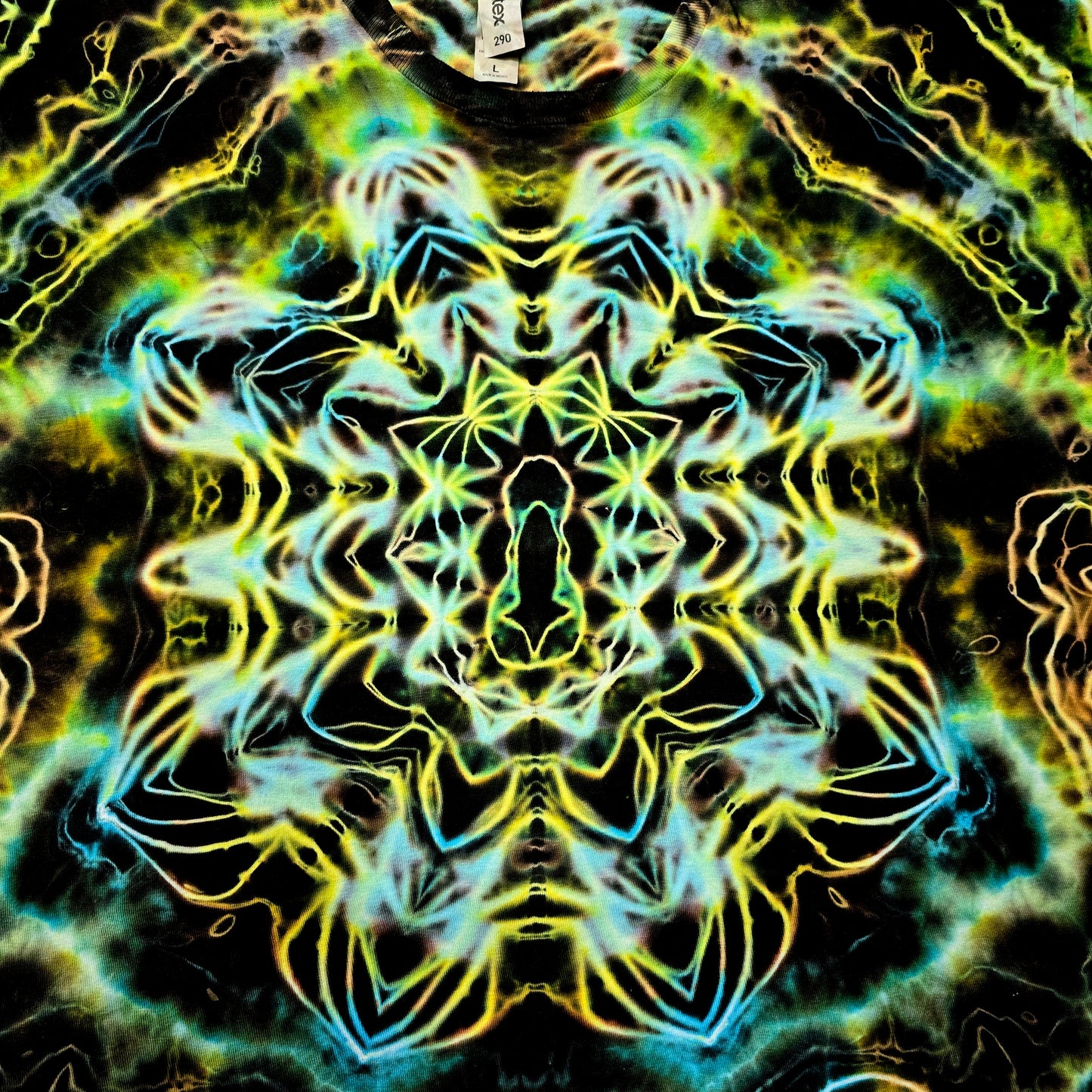 Close-up of central Hyper Fractal mandala with glowing blue and amber dye details