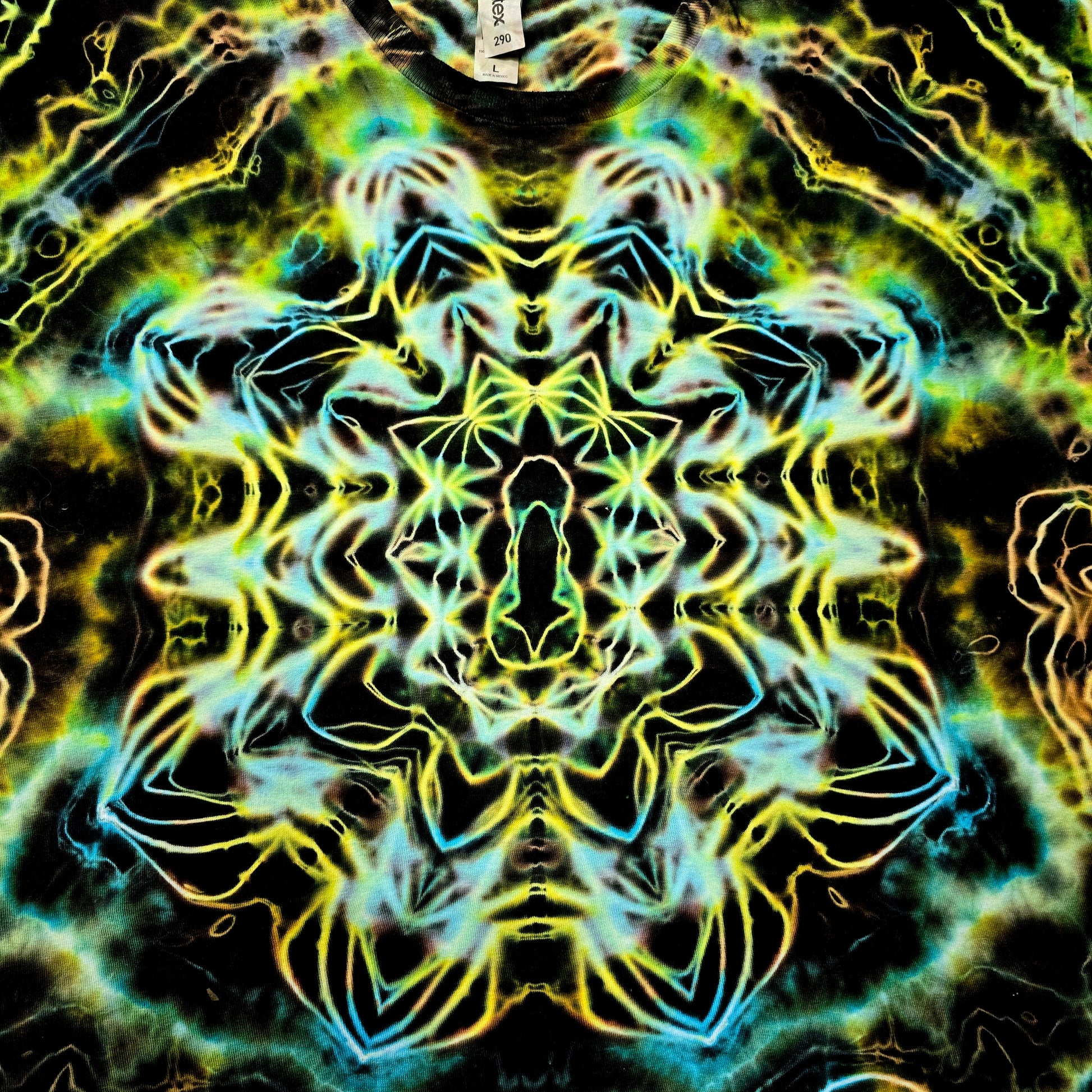 Close-up of central Hyper Fractal mandala with glowing blue and amber dye details