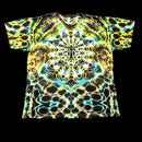 Handmade tie-dye tee with luminous blue, gold, and turquoise mirrored fractal pattern, front view