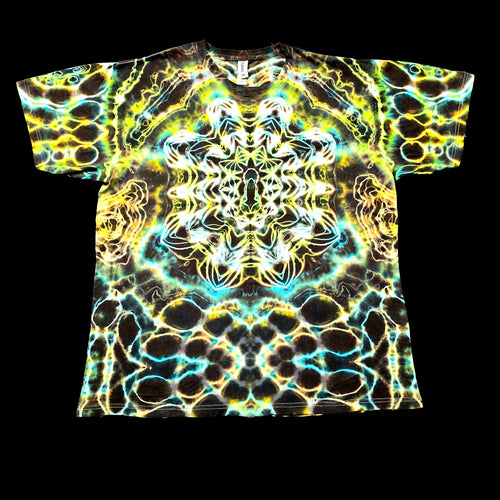 Handmade tie-dye tee with luminous blue, gold, and turquoise mirrored fractal pattern, front view