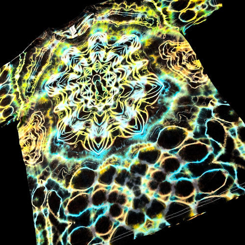 Angled front view of handmade tie-dye tee featuring layered aurora-like color flow