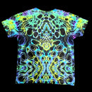 A short-sleeve crewneck t-shirt featuring a vibrant, symmetrical psychedelic neon pattern in yellow, green, blue, and purple over a black base, displayed flat against a solid black background.