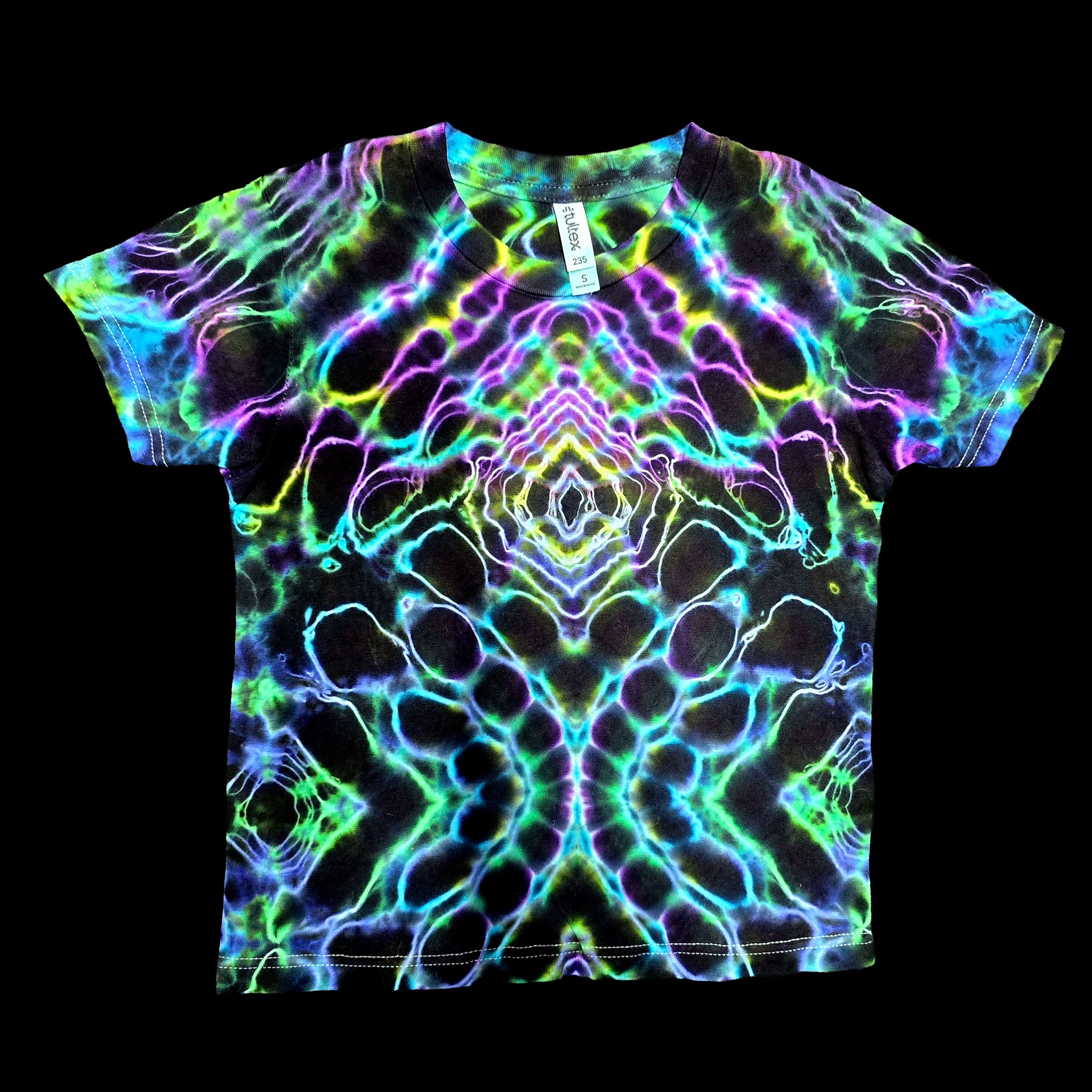 Front full flat view of handmade youth tie dye tee featuring central diamond pattern in cyan, lime, and purple on black cotton
