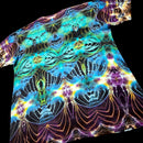 A short-sleeve t-shirt with a vibrant, psychedelic neon pattern featuring swirling waves of blue, green, purple, yellow, and orange on a black base, shown against a solid black background.