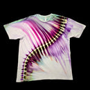 A short-sleeve crewneck tie-dye t-shirt laid flat against a solid black background. The shirt features a distinctive diagonal tie-dye pattern with vibrant purple, magenta, and green streaks over a white base, creating a feather-like or wing-like abstract design.