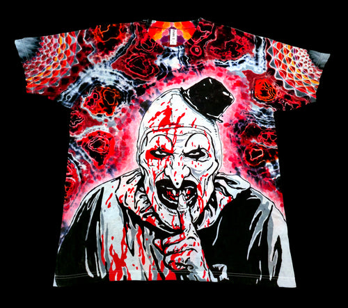 Front full flat view of handmade tie dye tee featuring Art the Clown graphic portrait with red and black geode background