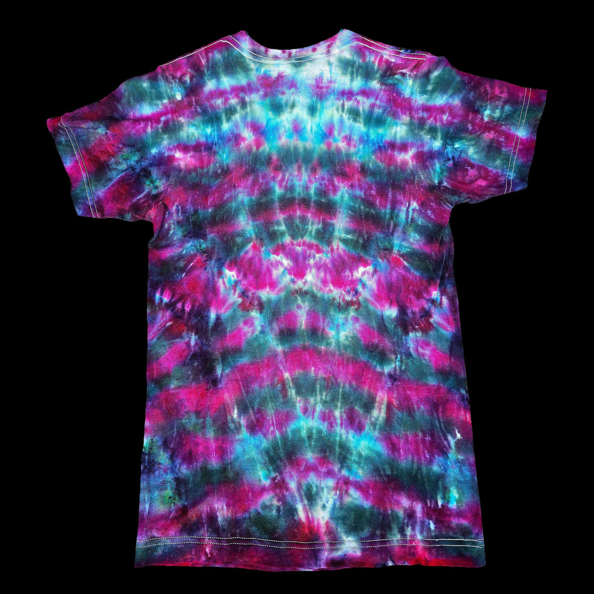 A short-sleeve tie-dye t-shirt. The shirt features a vibrant, symmetrical tie-dye pattern with swirling waves of magenta pink, cyan blue, and dark green.