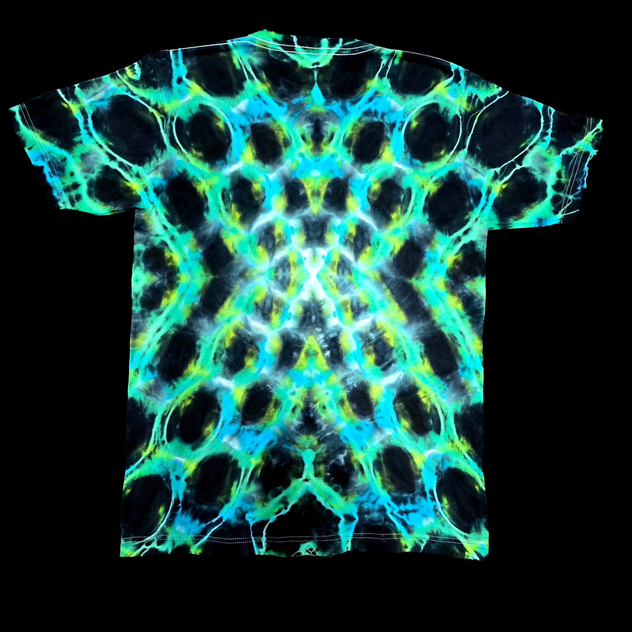 A short-sleeve crewneck t-shirt featuring a vibrant, symmetrical tie-dye pattern of neon green, cyan blue, and black, displayed flat against a solid black background.