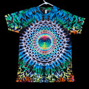 A short-sleeve t-shirt hanging on a white hanger against a solid black background, featuring a vibrant, symmetrical psychedelic mandala print with concentric circles and tie-dye patterns in blue, green, yellow, orange, pink, and white.