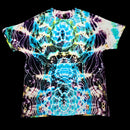 A short-sleeve crewneck t-shirt featuring a vibrant, symmetrical psychedelic tie-dye pattern with swirling waves of blue, purple, yellow, and white on a black base, presented flat against a solid black background.