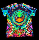 A short-sleeve crewneck t-shirt featuring a vibrant, high-contrast psychedelic tie-dye pattern with a central circular spiral and rainbow colors.
