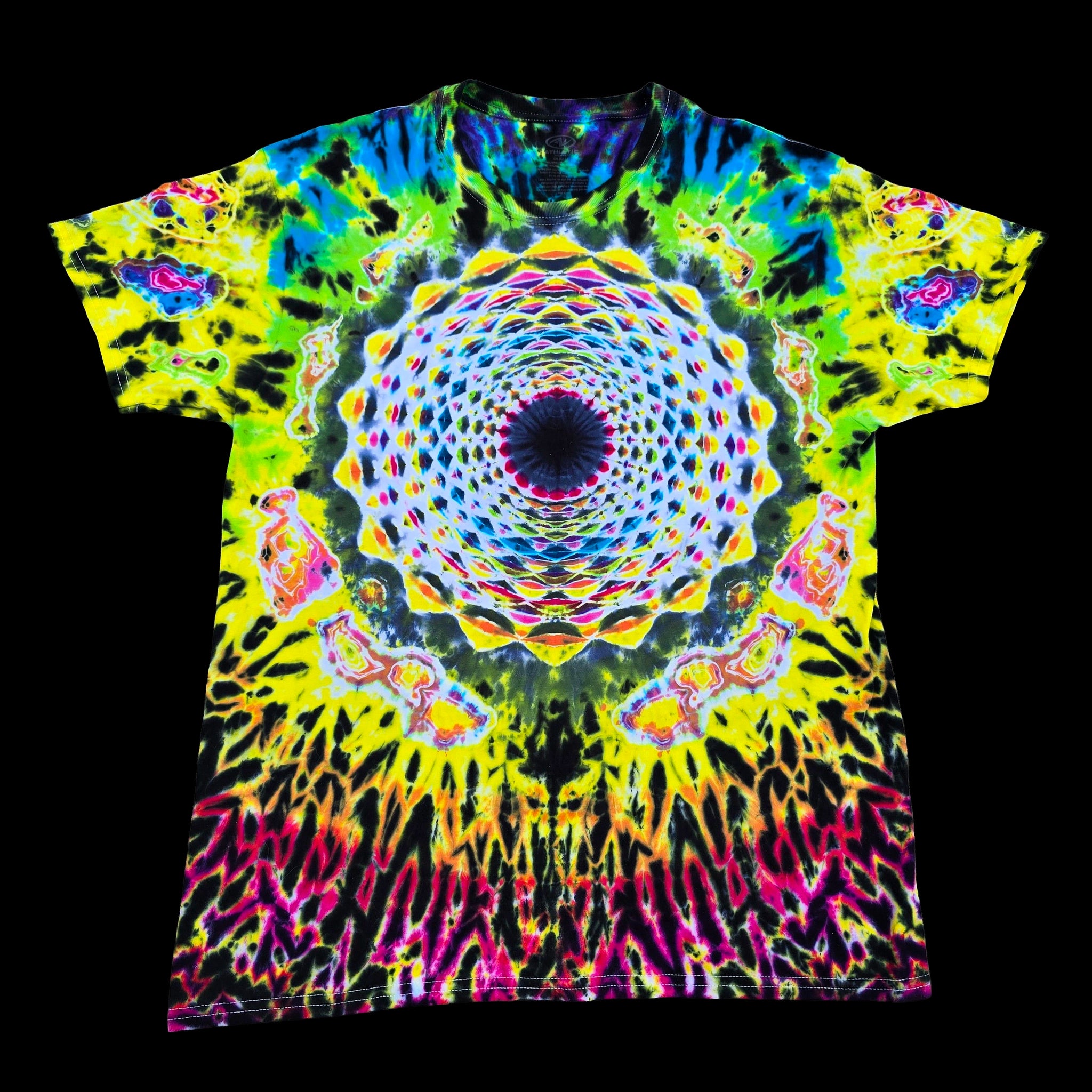 A short-sleeve crewneck t-shirt featuring a vibrant, symmetrical psychedelic mandala tie-dye pattern in neon yellow, green, blue, pink, and purple on a black background.