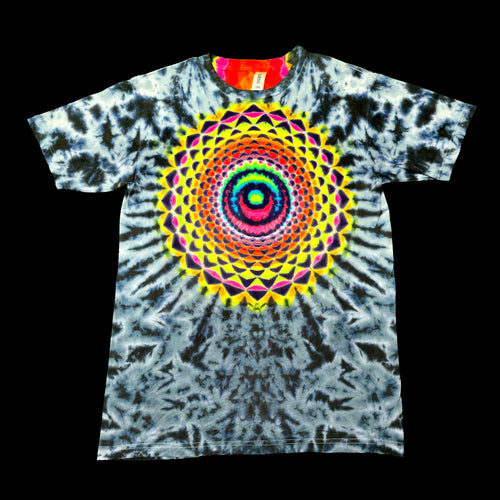 A short-sleeve tie-dye t-shirt featuring a large, vibrant mandala design in the center. The shirt has a blue, gray, and white tie-dye pattern with a bright multicolor spiral mandala graphic on the chest, displayed against a solid black background.