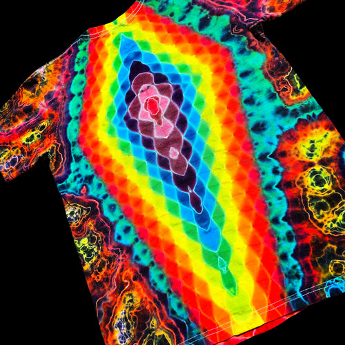 A short-sleeve t-shirt featuring a vibrant, multicolor tie-dye pattern with concentric rainbow diamond shapes and neon organic swirls on a black background.