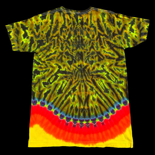 A short-sleeve tie-dye t-shirt. The shirt features a complex, symmetrical radial tie-dye pattern with yellow, green, and black dominating the upper body, and a contrasting wave of red, orange, and yellow with blue spiral accents along the lower hem.