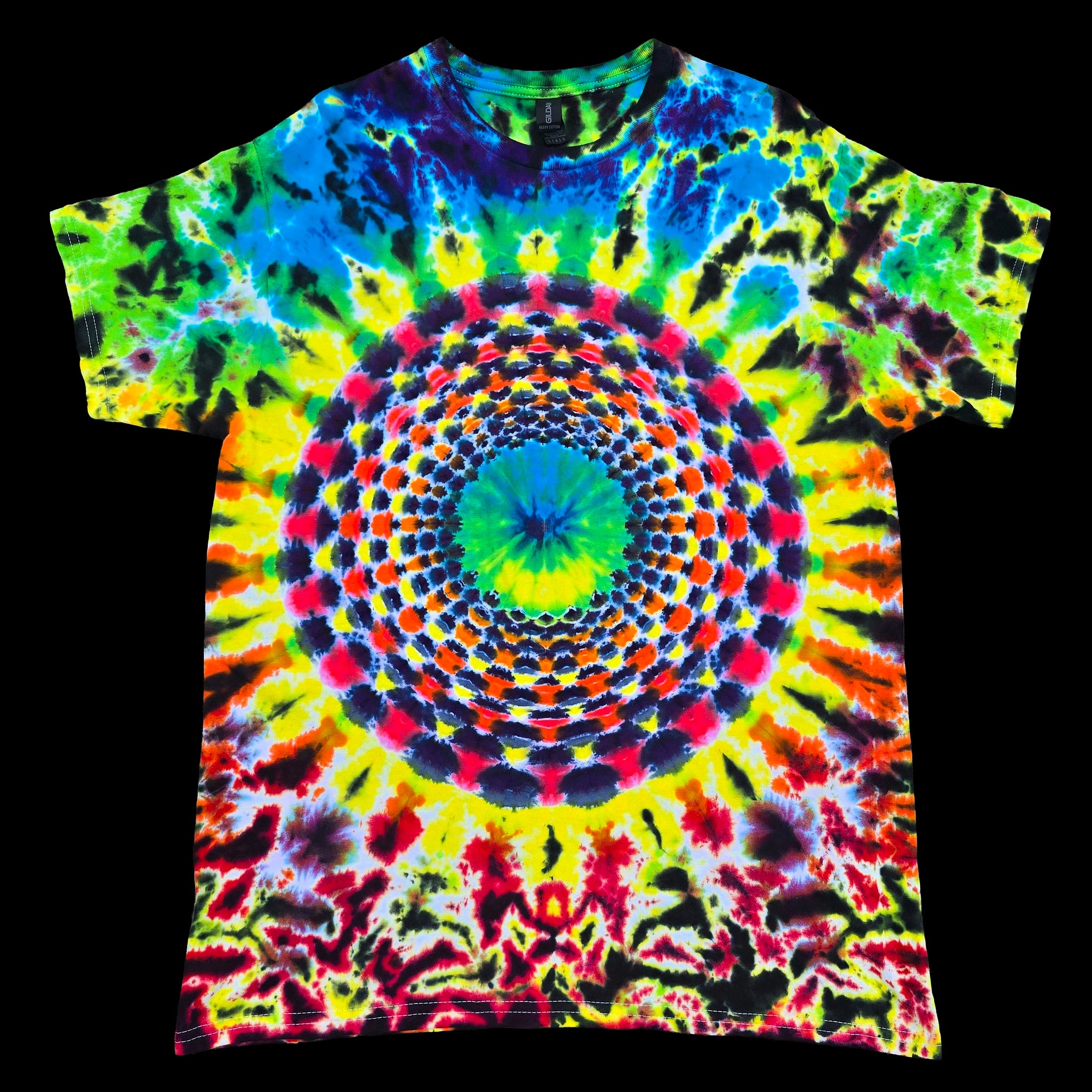 A short-sleeve crewneck t-shirt featuring a vibrant, multicolor tie-dye pattern with a large circular mandala design in the center, shown flat against a solid black background.