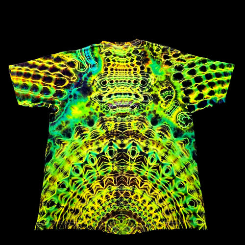 A short-sleeve crewneck t-shirt featuring a vibrant, symmetrical neon green, yellow, and black psychedelic pattern, displayed flat against a solid black background.