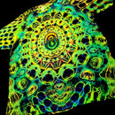 A close-up of a garment featuring a vivid psychedelic mandala pattern in neon green, yellow, blue, and purple on a black background.