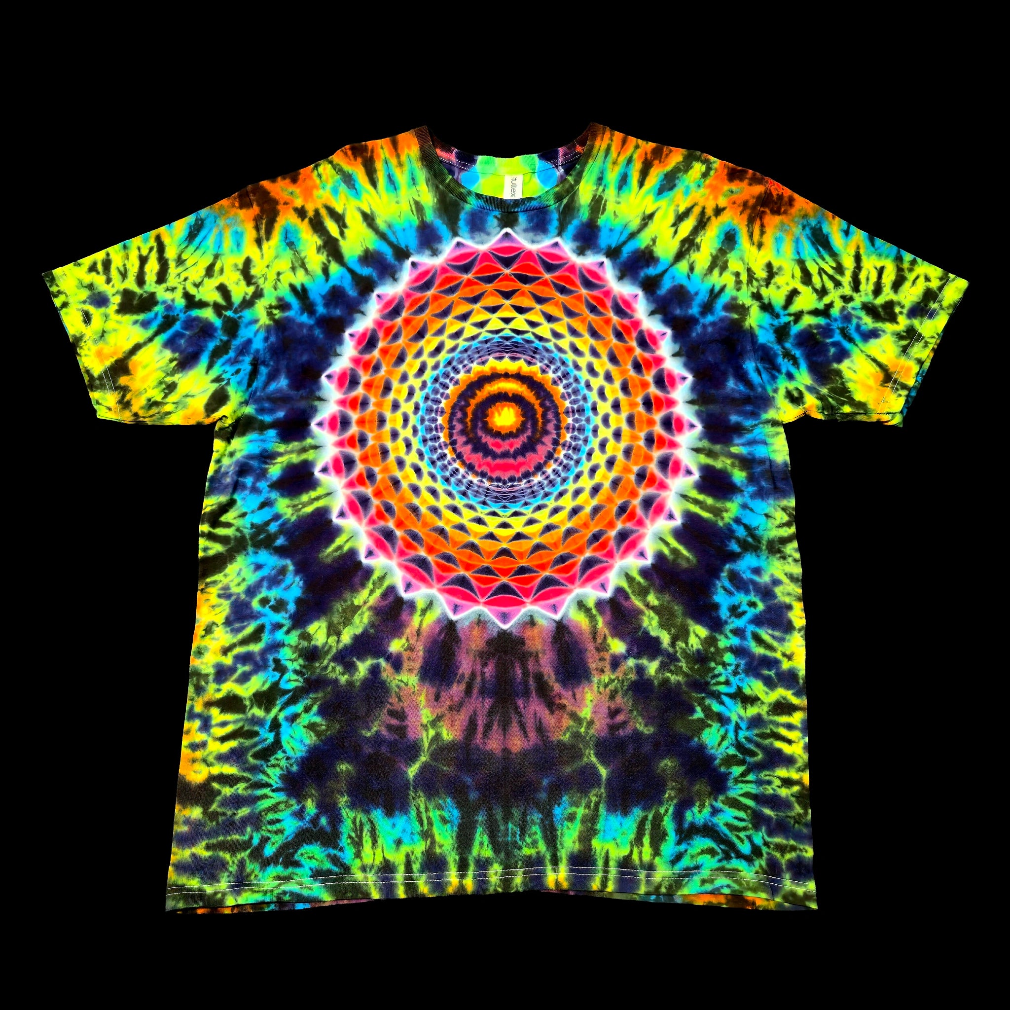 A short-sleeve crewneck t-shirt featuring a vibrant, symmetrical psychedelic tie-dye pattern with a large geometric mandala design in the center, displayed flat against a solid black background.
