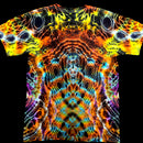 A short-sleeve crewneck t-shirt featuring a vibrant, symmetrical psychedelic abstract pattern with neon orange, yellow, blue, purple, and black tones, displayed flat against a solid black background.