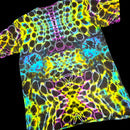 A short-sleeve crewneck t-shirt featuring a vibrant, neon psychedelic tie-dye pattern with glowing outlines of cells or bubbles in yellow, green, blue, pink, and purple over a black base.