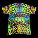 A short-sleeve crewneck t-shirt featuring a vibrant, symmetrical neon psychedelic pattern with glowing yellow, cyan, purple, and pink bubble-like shapes on a black base.