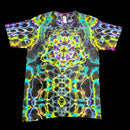 A short-sleeve crewneck t-shirt featuring a vibrant, symmetrical psychedelic kaleidoscope pattern with neon yellow, green, blue, purple, and pink glowing lines over a dark charcoal base.