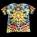A short-sleeve crewneck t-shirt featuring a vibrant, symmetrical psychedelic mandala print with neon yellow, purple, green, orange, and white patterns over a black background.