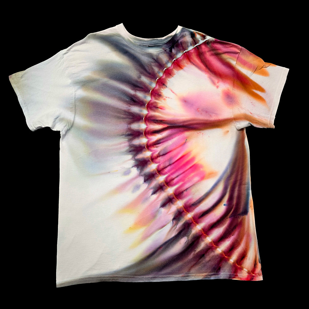 A short-sleeve crewneck tie-dye t-shirt with a spiral pattern in pink, purple, orange, and gray on a white base, shown against a solid black background.