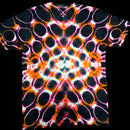 A short-sleeve crewneck t-shirt featuring a vibrant, symmetrical tie-dye pattern with black, orange, pink, and white circular motifs.