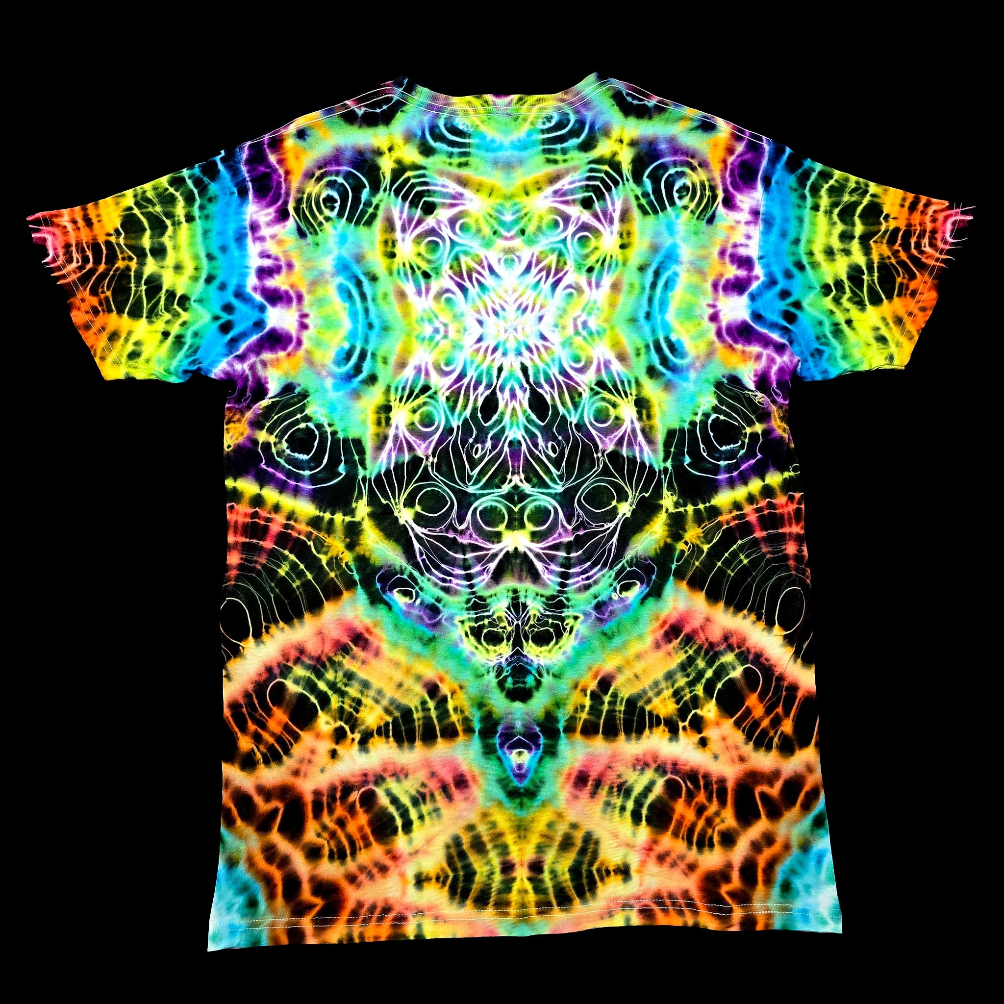 A short-sleeve crewneck t-shirt featuring a vibrant, symmetrical psychedelic kaleidoscope pattern with neon rainbow colors.
