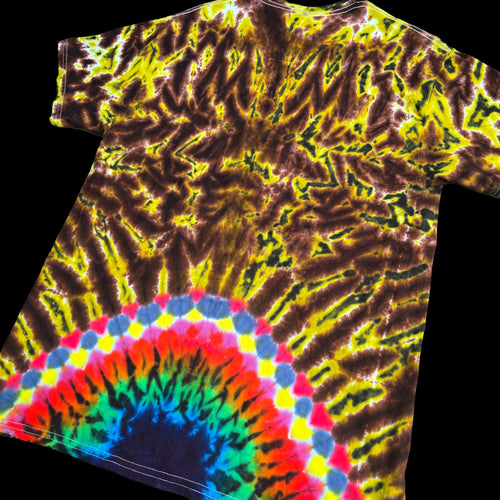 A short-sleeve tie-dye t-shirt featuring a brown and yellow spiral pattern with a vibrant rainbow arch at the bottom, displayed against a solid black background.
