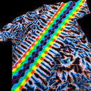A short-sleeve t-shirt featuring a psychedelic rainbow tie-dye pattern overlaid on a brown and black zebra-like abstract print, set against a solid black background.