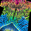 A close-up of a tie-dye patterned fabric with vivid neon colors including pink, orange, green, blue, and black in a marbled, flame-like pattern.