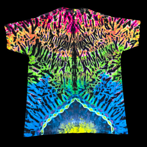 A short-sleeve crewneck t-shirt featuring a vibrant, symmetrical neon tie-dye pattern with multiple colors including pink, orange, yellow, green, blue, and purple on a black base, shown against a solid black background.