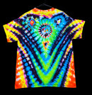A short-sleeve tie-dye T-shirt hanging on a black hanger against a solid black background. The shirt features a highly symmetrical, psychedelic pattern with concentric circles and V-shaped bands of neon yellow, green, blue, purple, and orange.