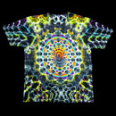 A short-sleeve crewneck t-shirt featuring a vibrant, symmetrical psychedelic kaleidoscope print with neon yellow, green, blue, purple, and orange patterns on a black base, shown flat against a solid black background.
