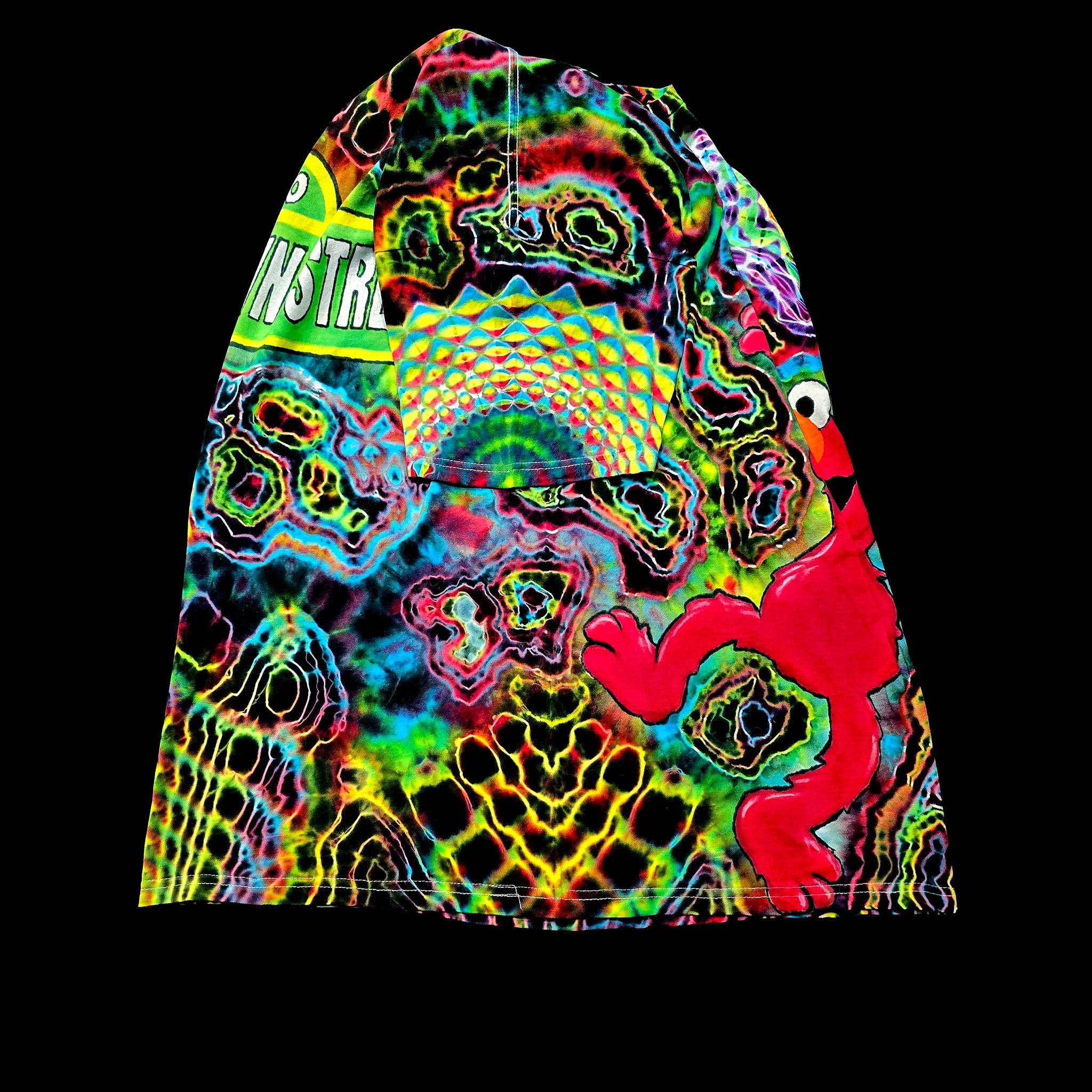 A neon tie-dye tee featuring a bright red Elmo character graphic on the front, set against a solid black background.