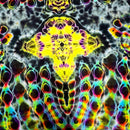 A close-up of a tie-dye fabric pattern with a highly symmetrical, kaleidoscopic design featuring neon yellow, green, blue, purple, pink, and orange on a dark gray and black base.