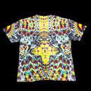A short-sleeve crewneck t-shirt featuring a vibrant, symmetrical psychedelic tie-dye pattern with neon yellow, pink, blue, green, and purple on a black base, displayed flat against a solid black background.